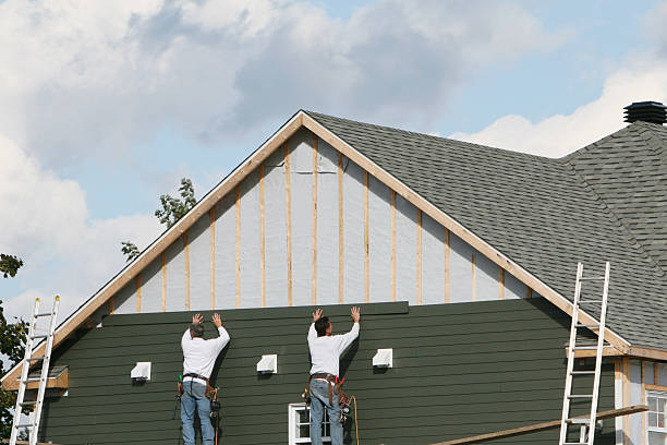 Professional Storm Damage Siding Repair technician working in Grasonville, MD